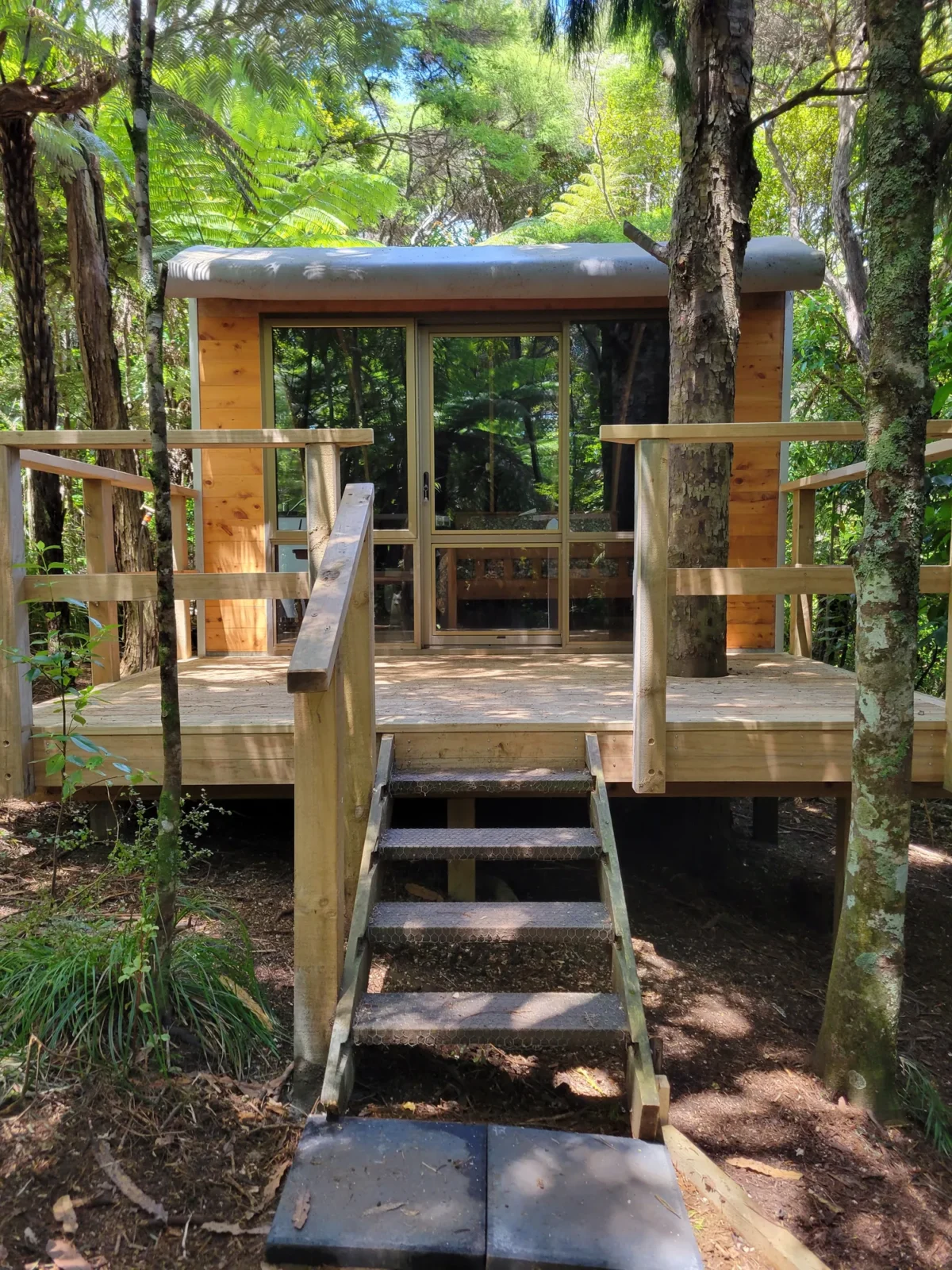 Exterior staircase entrance to the Forest Cabin at Totara Enclave