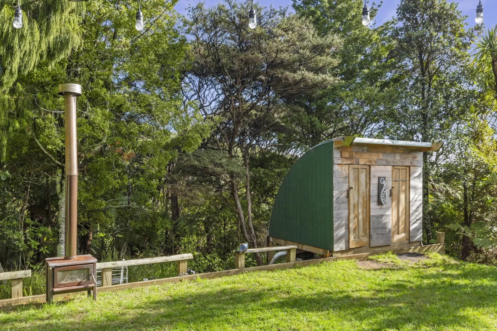 Toilet building and fireplace at Totara Enclave